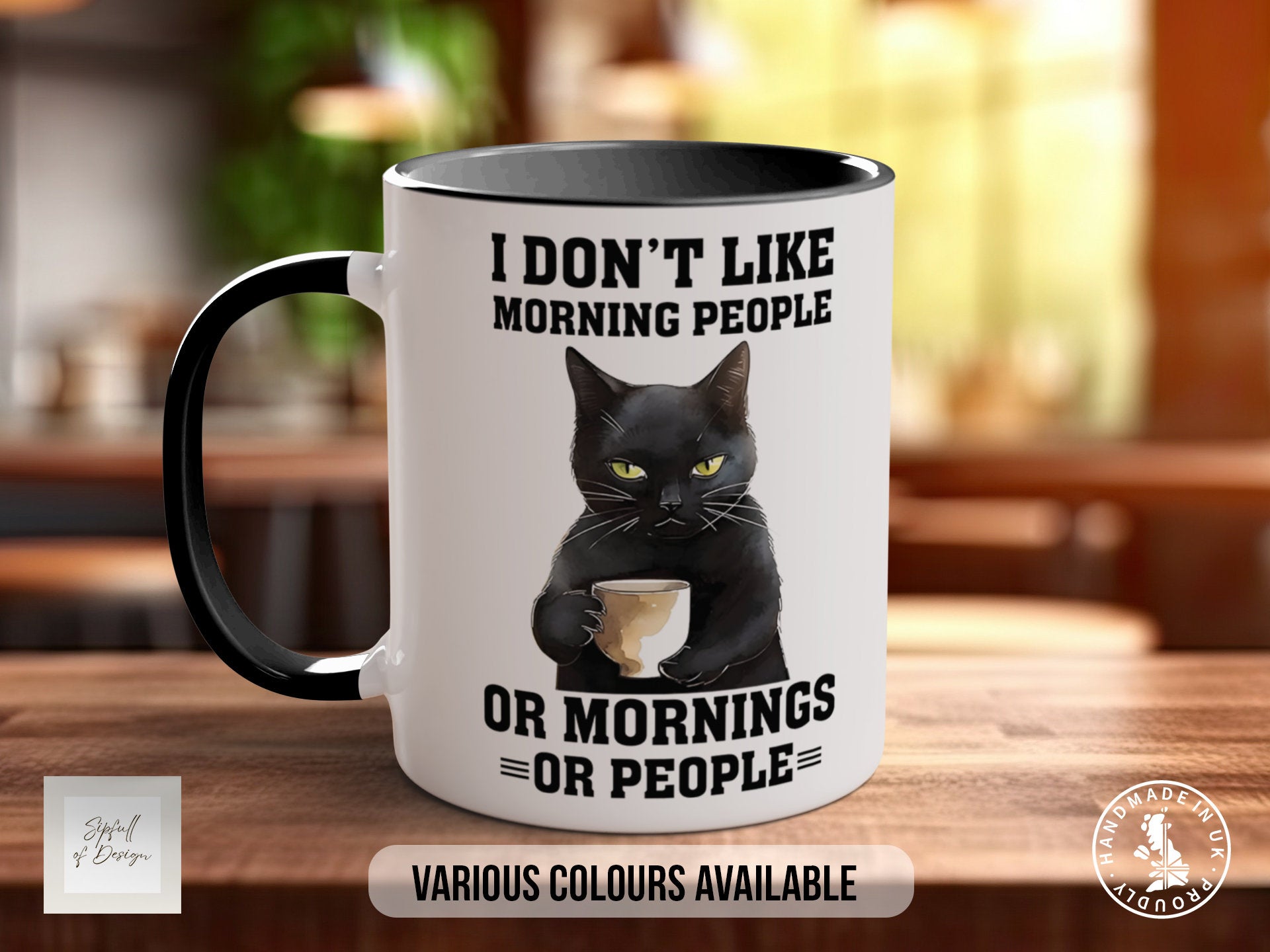 a coffee mug with a black cat holding a cup of coffee